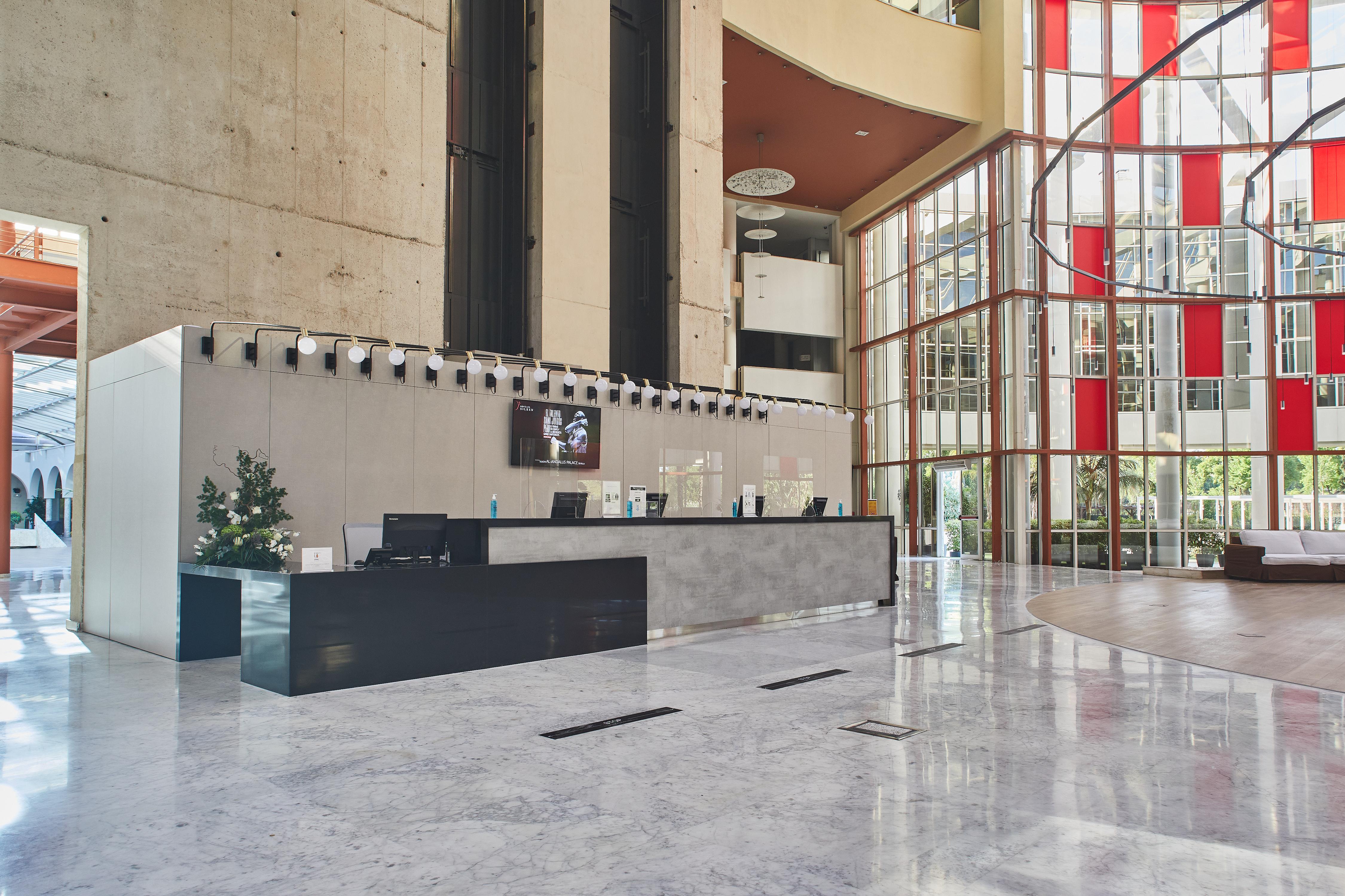 Silken Al-Andalus Palace Seville Exterior photo Reception desk