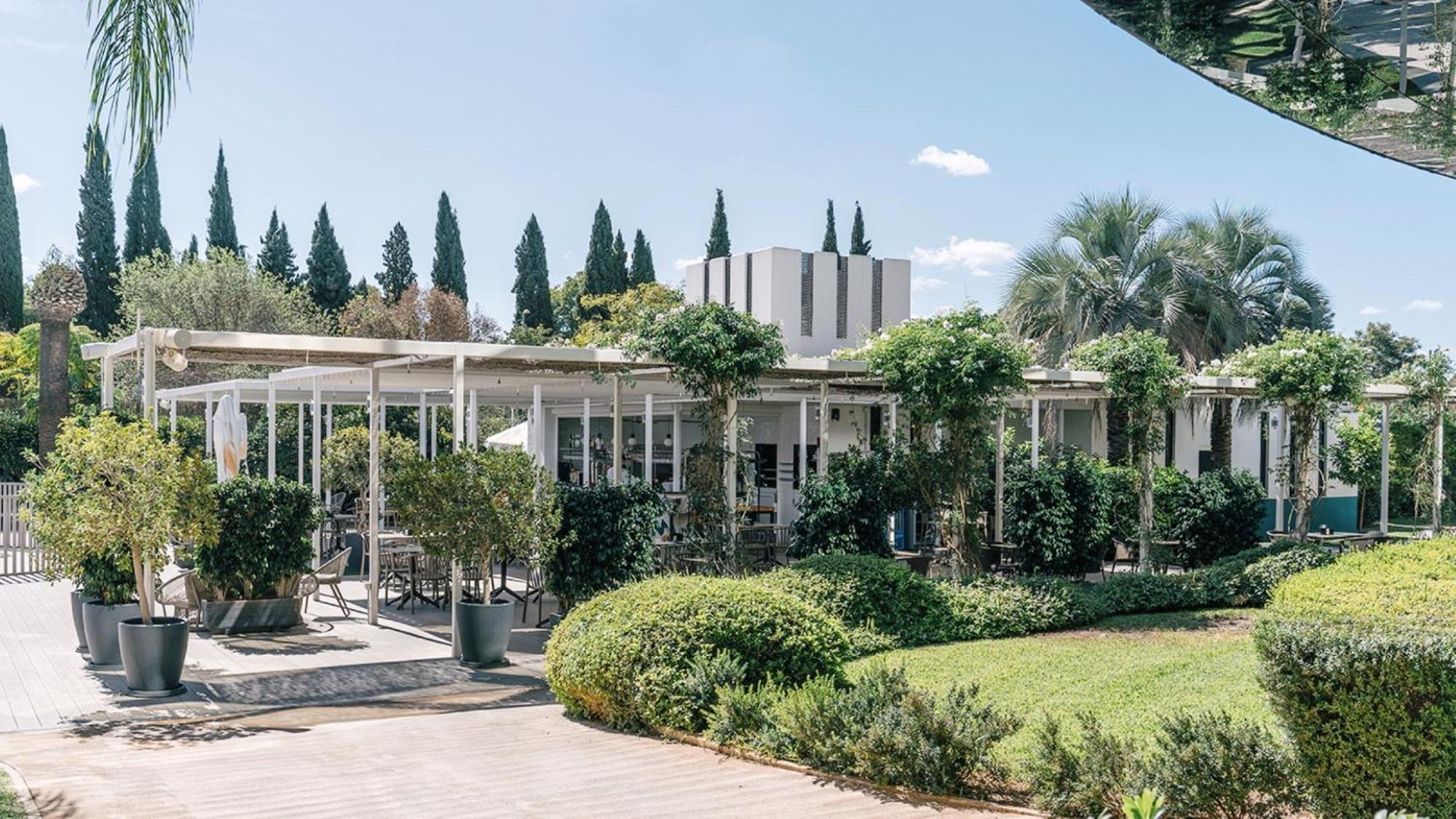 Silken Al-Andalus Palace Seville Exterior photo The main building of the park